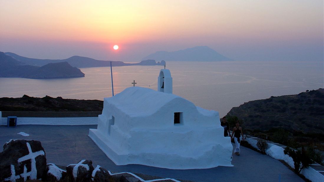 <strong>Kilma: </strong>The small church on the hill above Klima offers perfect views of the bay of Adamantas and the setting sun.