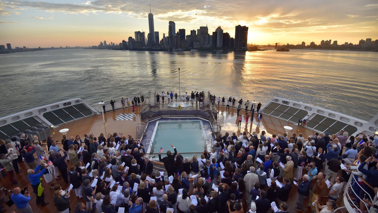 The scene aboard the QM2 as it arrived in New York on July 1.