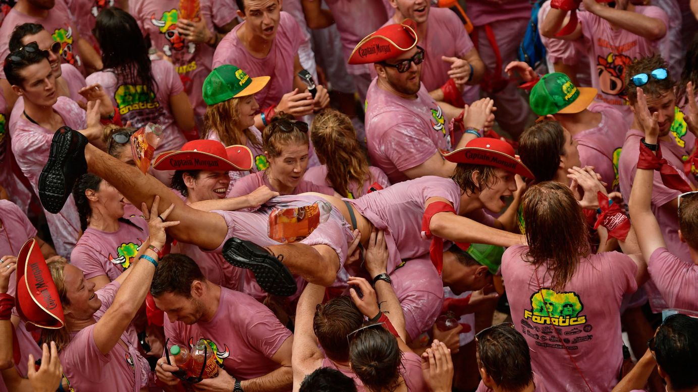 Revelers party at the opening of the San Fermin festival in Pamplona, Spain, on Thursday, July 6. The festival is world-renowned for its <a href="http://www.cnn.com/travel/article/spain-bull-running/index.html" target="_blank">"running of the bulls."</a>