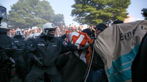 Police and protesters clash during the Welcome to Hell march.