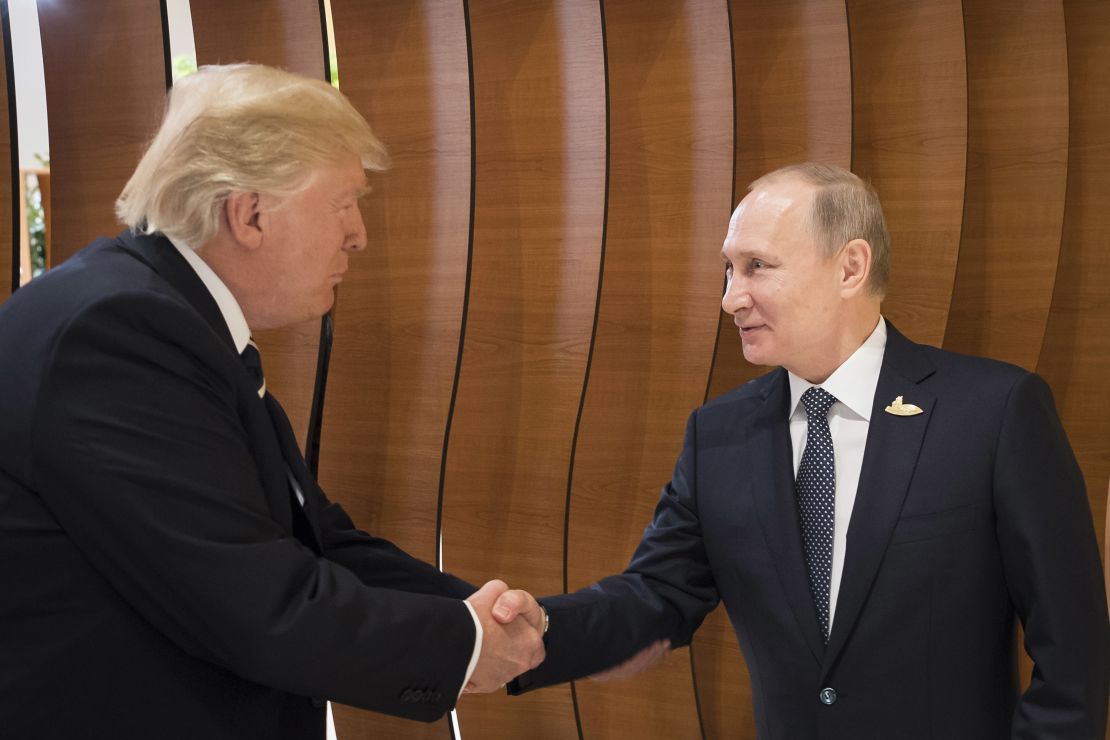 Trump Putin handshake