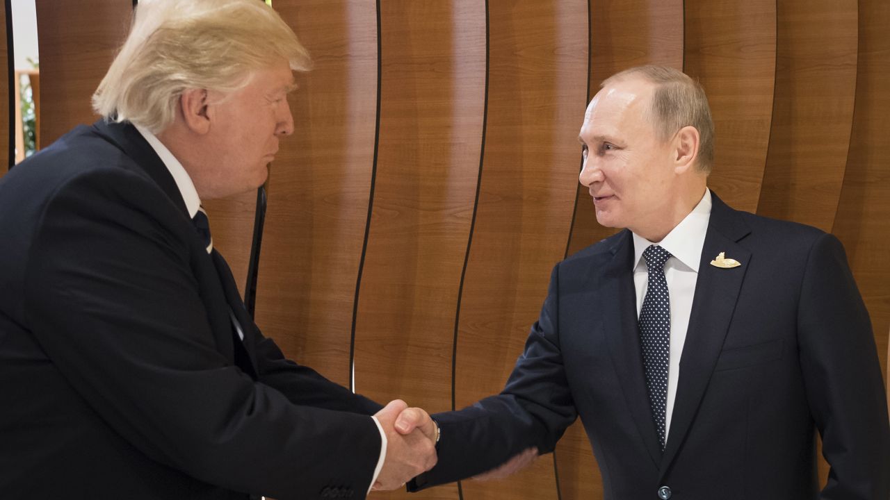 HAMBURG, GERMANY - JULY 07: In this photo provided by the German Government Press Office (BPA) Donald Trump, President of the USA (left), meets Vladimir Putin, President of Russia (right), at the opening of the G20 summit on July 7, 2017 in Hamburg, Germany. The G20 group of nations are meeting July 7-8 and major topics will include climate change and migration.  (Photo by Steffen Kugler /BPA via Getty Images)