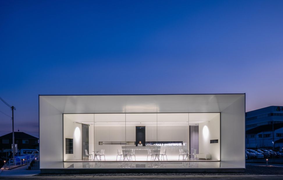 This pharmacy in Himeji City, Japan, features a minimalist white interior with black accents. The architects hope that the interior will convey a sense of "advanced medical care" that patients would expect. 