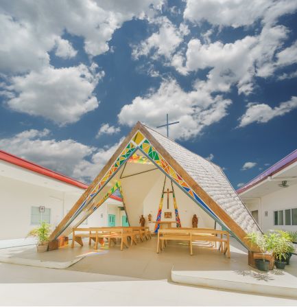 This chapel is located within a hospital in Pambujan, a small rural town in the Philippines. The chapel features stained glass in the entry as well as the back of the alter. 