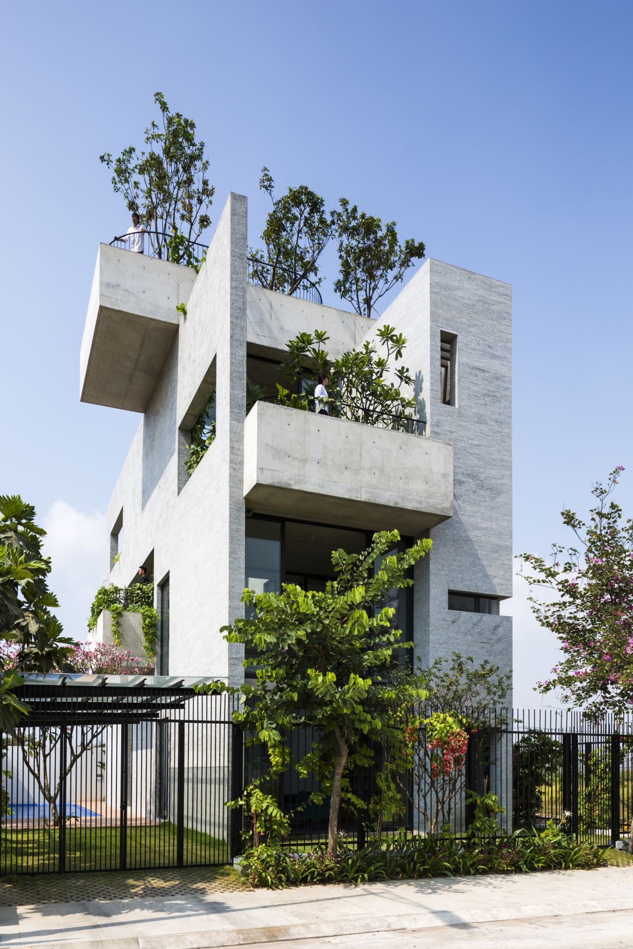 The Binh House in Ho Chi Minh City, Vietnam, features several spaces -- from the roof to the balconies -- for trees and plants. The architects hope that this will increase the presence of green spaces in cities. 