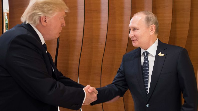 Trump greets Putin as the G20 summit gets underway in Hamburg.