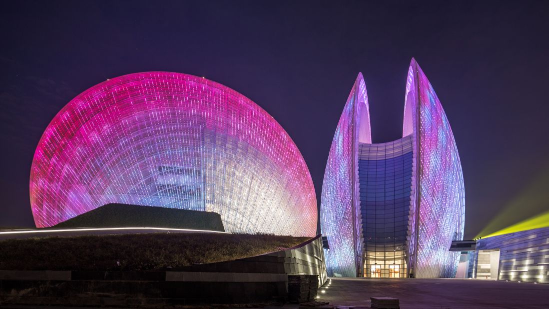 The Zhuhai Opera House in Zhuhai, China, is built of two shell-like structures, the larger of which sits at 90 meters (295 feet) tall, and the smaller at 60 meters (197 feet) tall. Collectively, both buildings can seat over 2,000 people. 
