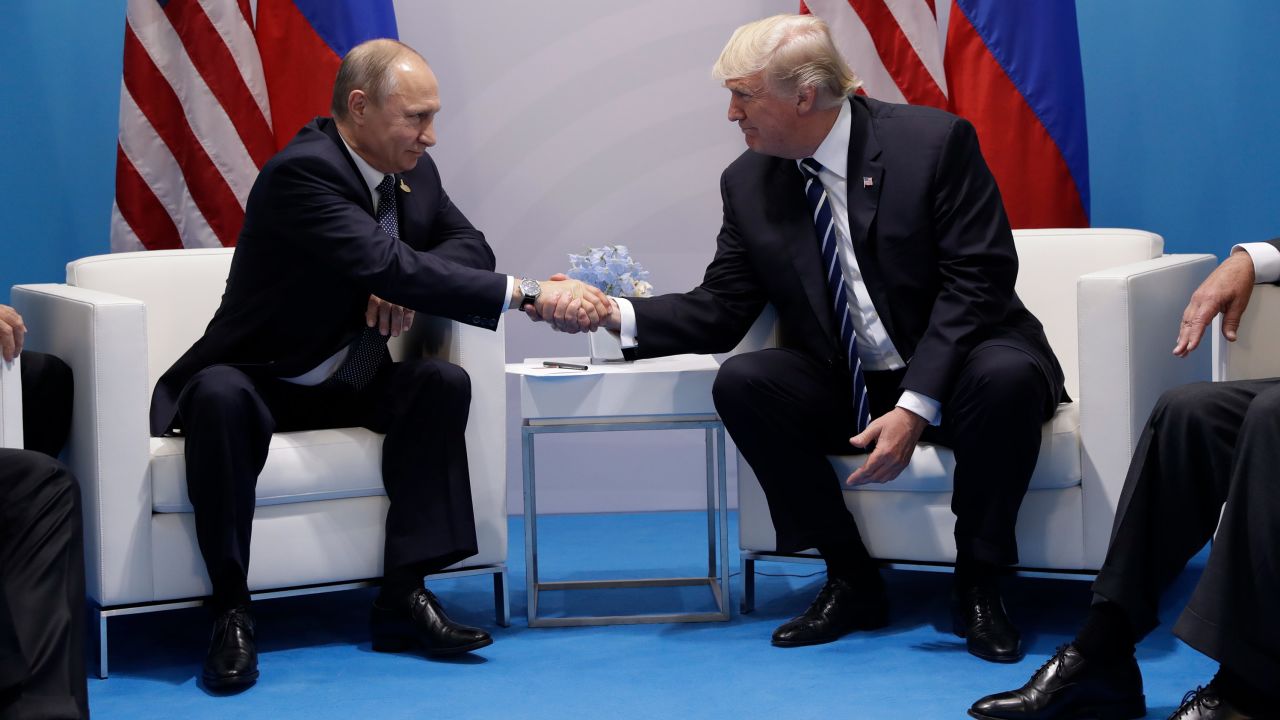 President Donald Trump shakes hands with Russian President Vladimir Putin at the G20 Summit, Friday, July 7, 2017, in Hamburg. (AP Photo/Evan Vucci)