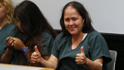 Isabel Martinez gives a thumbs-up to cameras as she appears in court Friday in Lawrenceville, Georgia.