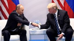 US President Donald Trump and Russia's President Vladimir Putin shake hands during a meeting on the sidelines of the G20 Summit in Hamburg, Germany, on July 7, 2017. (SAUL LOEB/AFP/Getty Images)