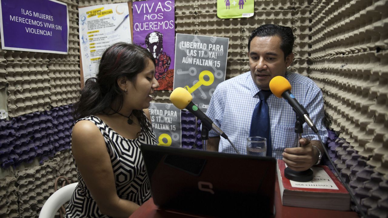 Dennis Muñoz, a lawyer working with rights groups to free women in prison on abortion charges, talks during a radio program.