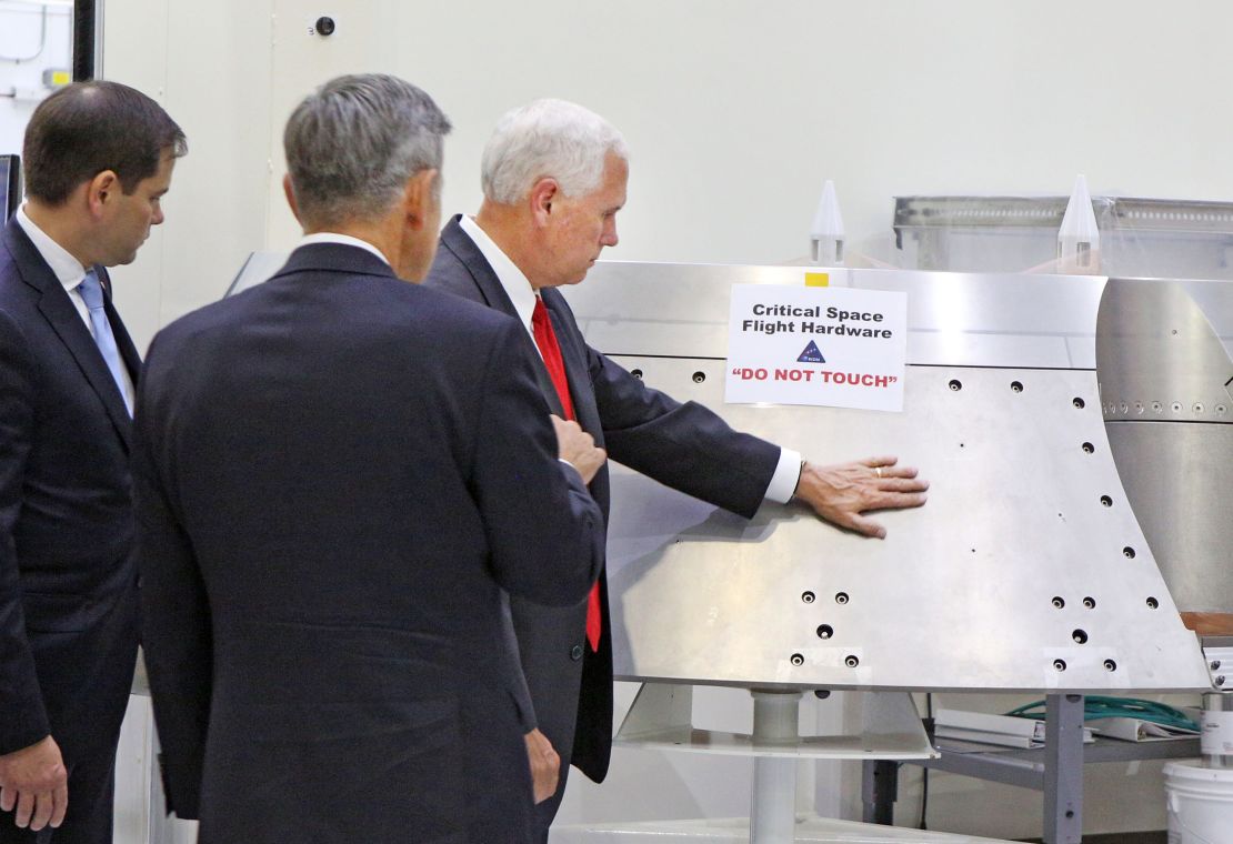 Vice President Mike Pence, right, gets a tour of the Orion clean room with Sen. Marco Rubio, left, by Bob Cabana, Director Kennedy Space Center, center,  Thursday, July 6, 2017.  (Red Huber/Orlando Sentinel/TNS via Getty Images)