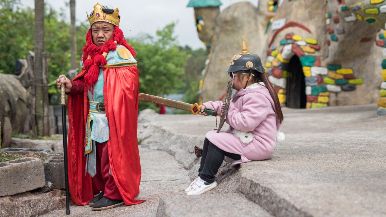 A "king" is one of many cast in performances at the Kingdom of the Little People. The actors perform twice daily.