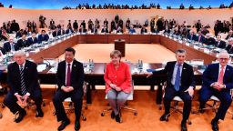 TOPSHOT - (L-R) US President Donald Trump, China's President Xi Jinping, German Chancellor Angela Merkel, Argentina's President Mauricio Macri and Australia's Prime Minister Malcolm Turnbull at the start of the firstG20  working session of the G20 meeting in Hamburg last week.