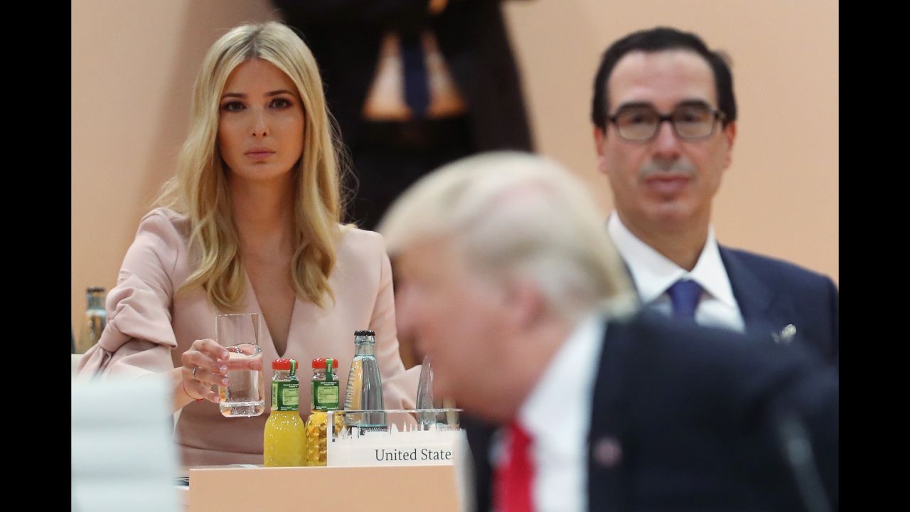 Ivanka Trump and US Treasury Secretary Steven Mnuchin are on hand as the President arrives for the G20's morning working session on July 8.
