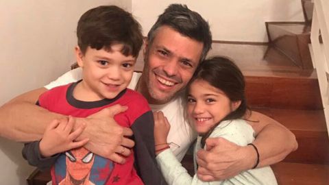 Leopoldo Lopez joins his children at home in a photo released by his family.