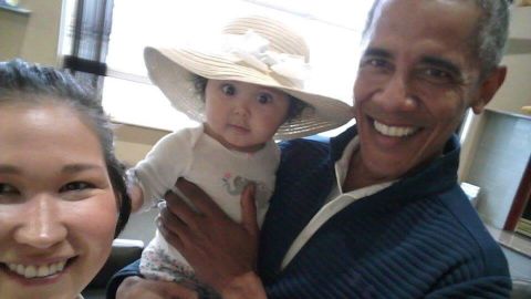 Jolene Jackinsky snaps a selfie after she and 6-month-old Giselle were greeted by none other than former U.S. President Barack Obama at Anchorage International Airport in Alaska. 