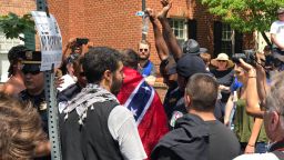 Police break up a confrontation between anti-KKK protesters on Saturday in Charlottesville, Virginia.