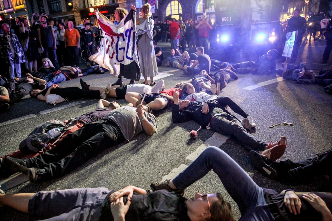 Electronic music was the soundtrack to a late night dance party at Reeperbahn, where activists created a human peace sign in front of water cannons parked in front of the rally.