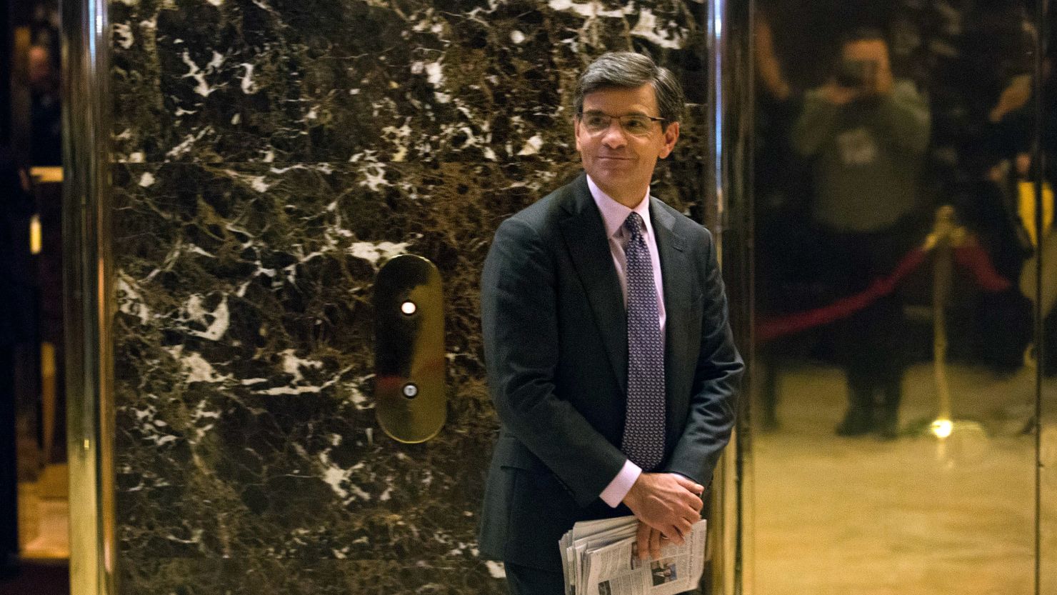 Journalist George Stephanopoulos emerges from the elevators following a visit to Trump Tower on November 21, 2016 in New York City.