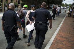 A counter protestor is arrested Saturday in Charlottesville.