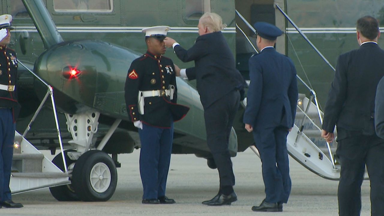 Trump retrieves marine hat bright