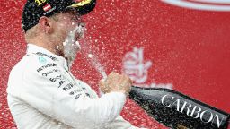 Valtteri Bottas celebrates in customary style after his victory in Austria.
