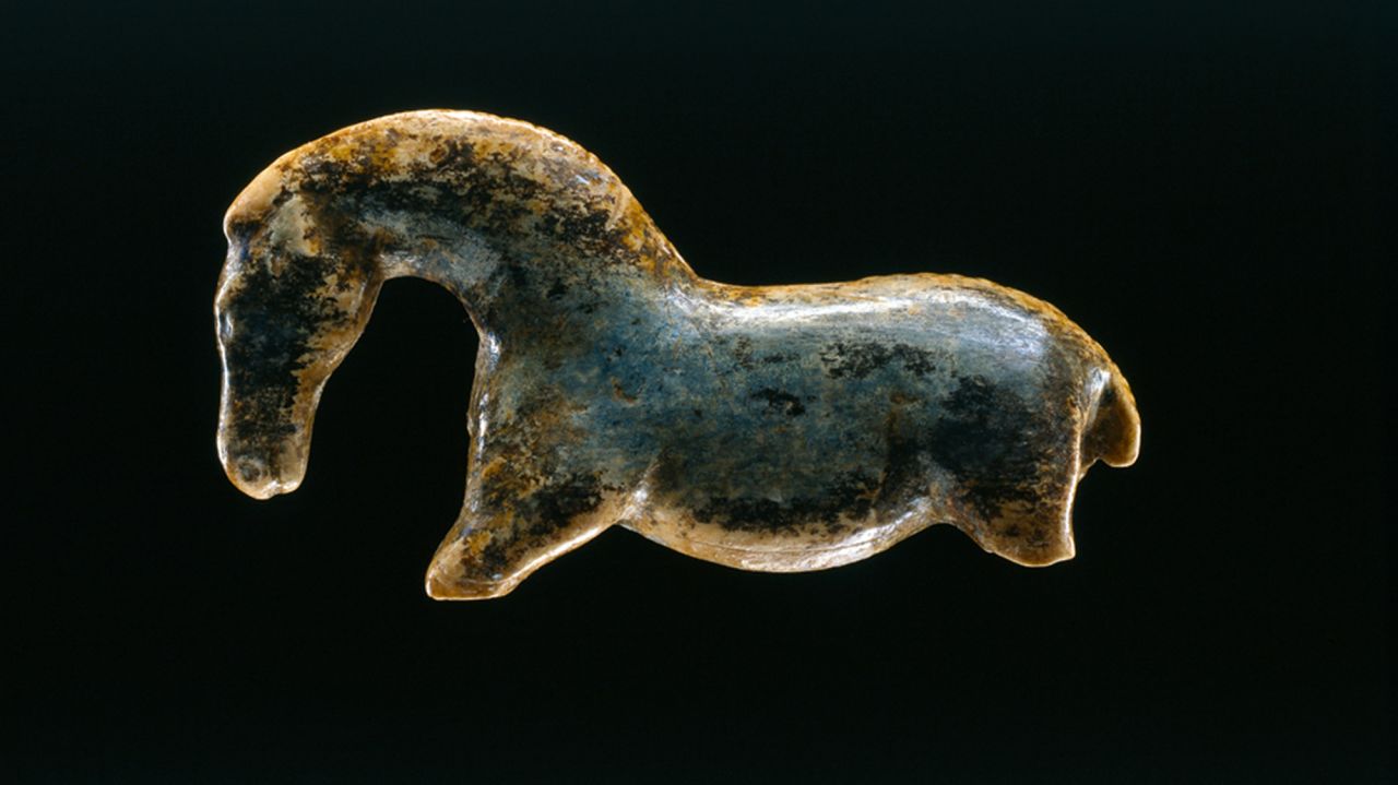 This wild horse figurine was found in the Vogelherd Cave in the Lone Valley. It is made from mammoth ivory and is 4.8 centimeters in length. It is believed to be around 40,000 years old and is now on display at a museum in the German city of Tubingen.