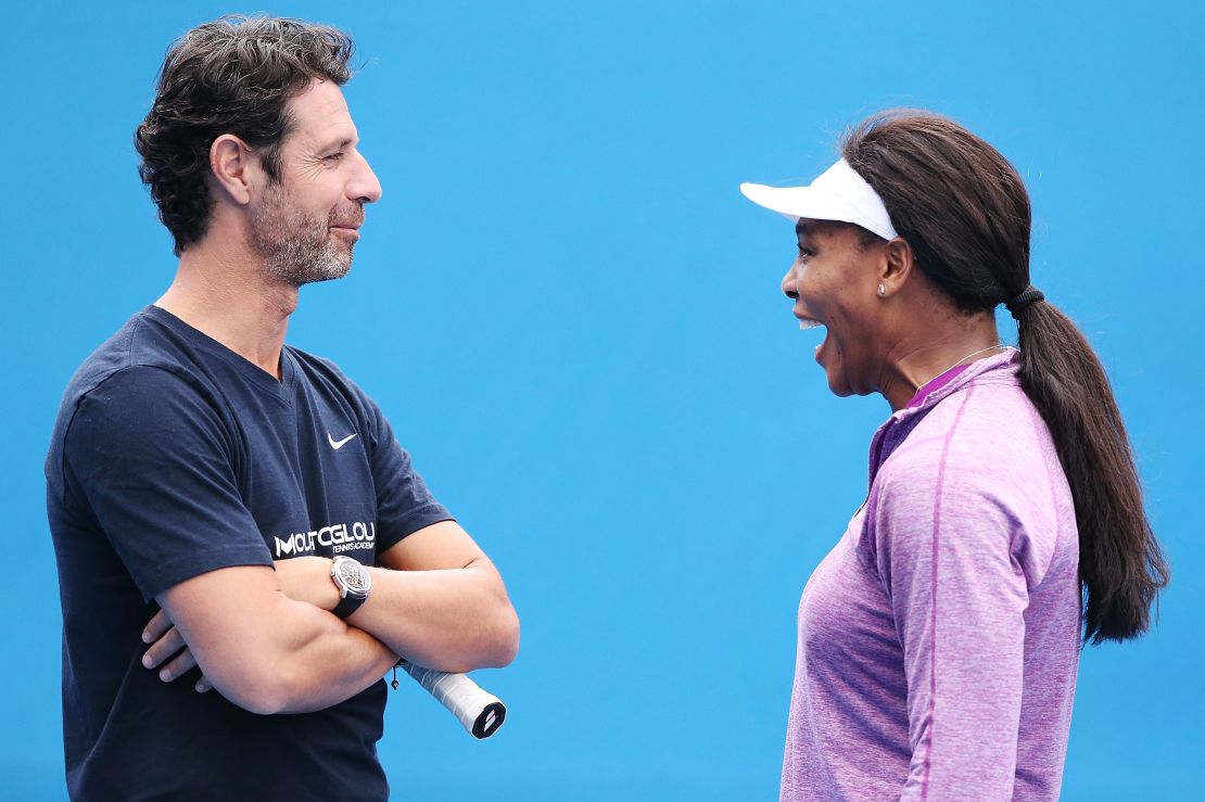 Mouratoglou and Serena share a joke.