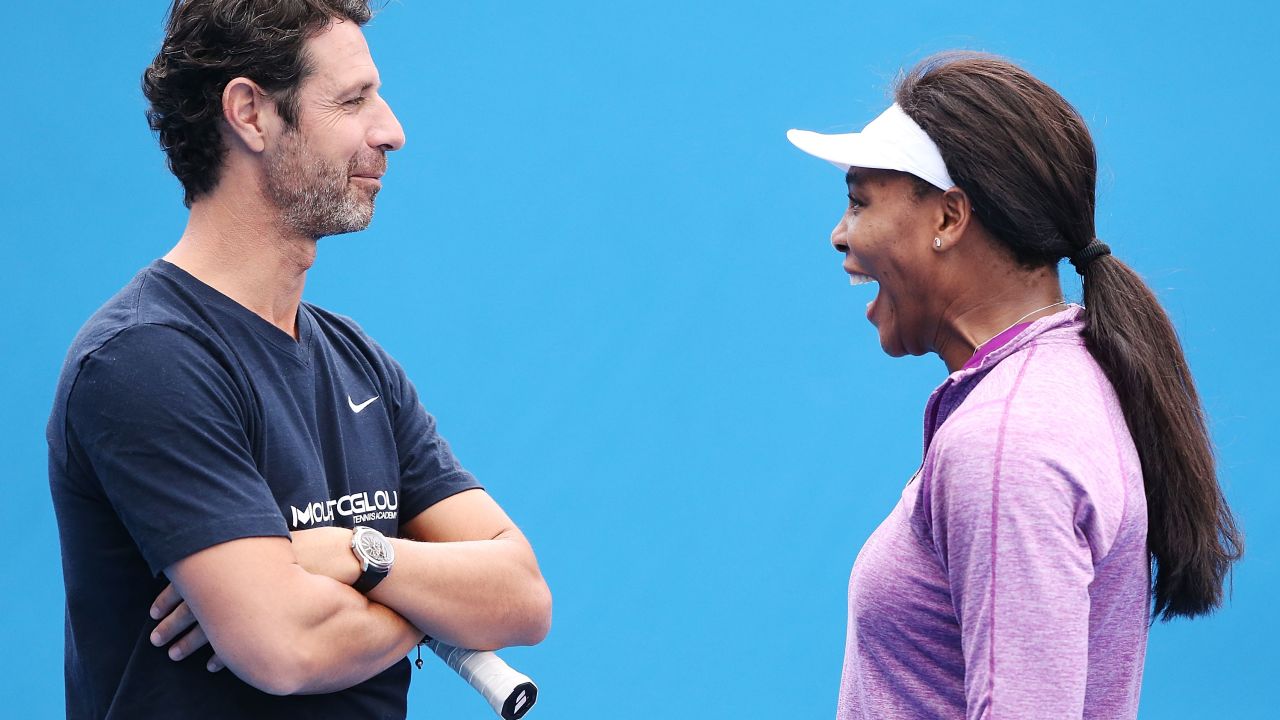 Mouratoglou and Serena share a joke.