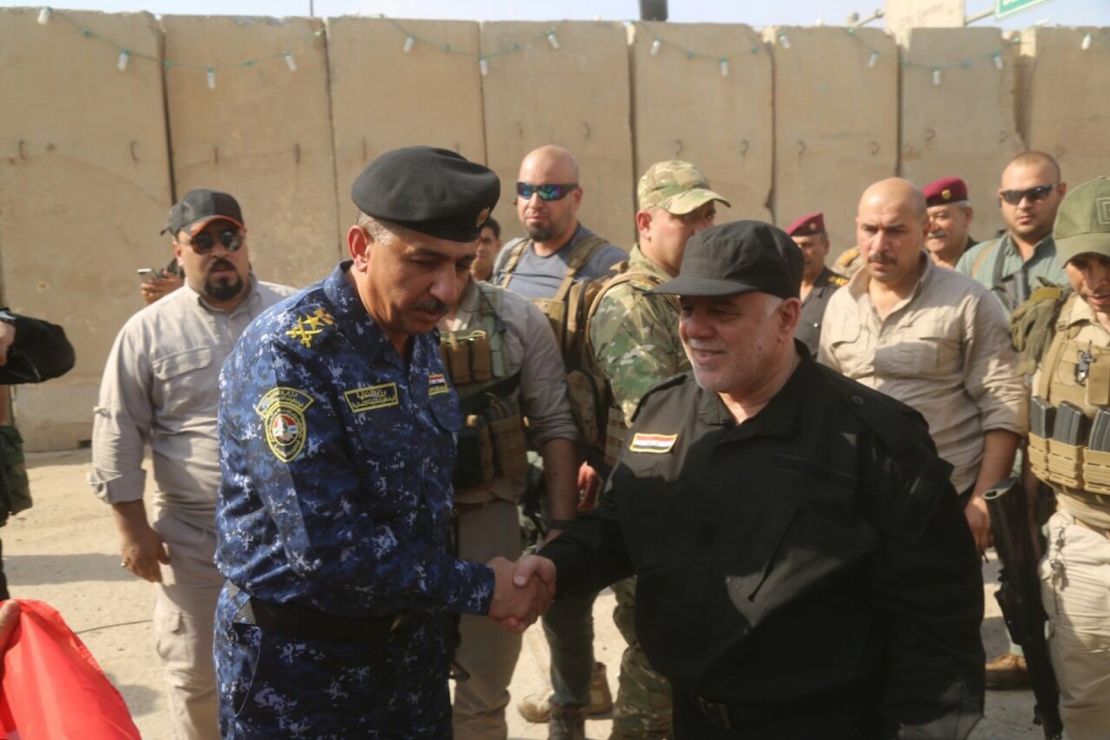 Iraqi Prime Minister Haidar al-Abadi visiting the governor of Mosul and walking through eastern Mosul streets and meeting residents.