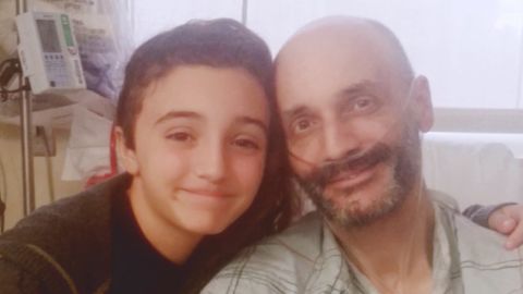Gene LoCastro before lung transplant surgery with his daughter, Brooke, 12.