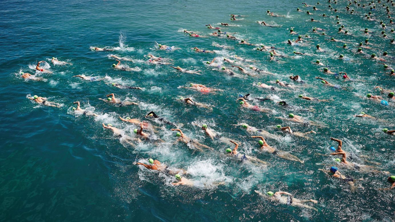 Swimmers begin a race to cross Switzerland's Lake Zurich on Wednesday, July 5. The course was 1,500 meters (4,921 feet).