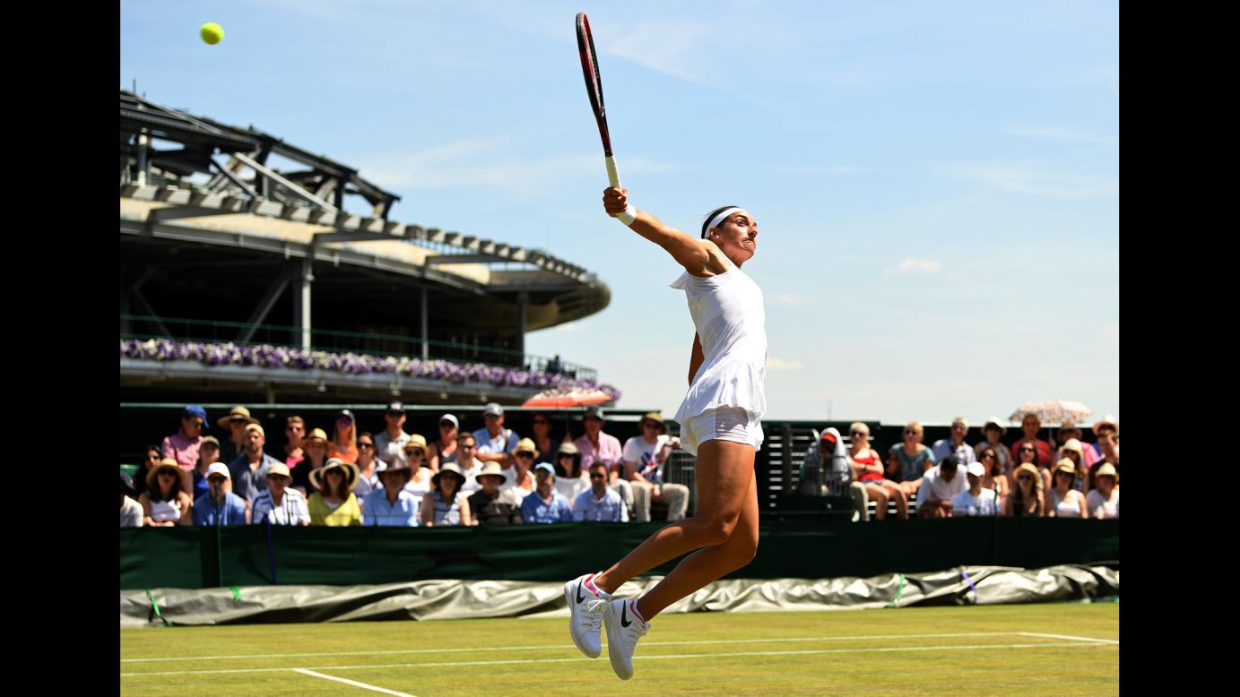 Caroline Garcia stretches for a backhand shot during her third-round match at Wimbledon on Friday, July 7. Garcia advanced with a 6-4, 6-3 victory over Madison Brengle.