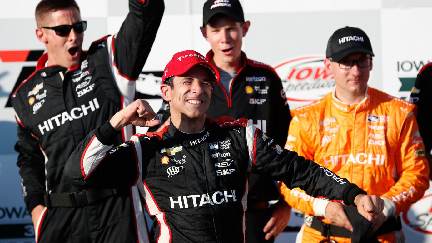Helio Castroneves celebrates in Victory Lane after winning the IndyCar race at Iowa Speedway on Sunday, July 9. It was his first IndyCar victory since 2014.