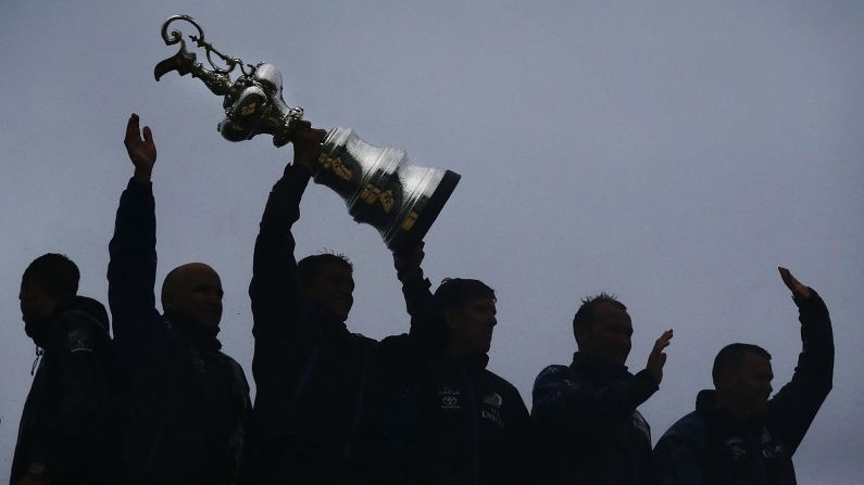 Members of Emirates Team New Zealand lift the America's Cup during their victory parade in Auckland, New Zealand, on Thursday, July 6. <a href="index.php?page=&url=http%3A%2F%2Fwww.cnn.com%2F2017%2F06%2F26%2Fsport%2Famericas-cup-team-new-zealand-beat-oracle-team-usa%2Findex.html" target="_blank">The Kiwis trounced Oracle Team USA</a> to win back the sailing title they lost last year.