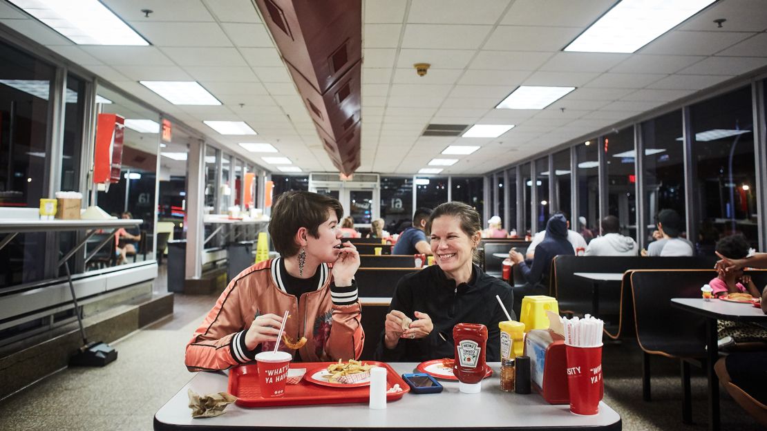 Lillian DeJean, 15, and her mother, Nicole, have dinner at The Varsity during a pit stop in Atlanta.