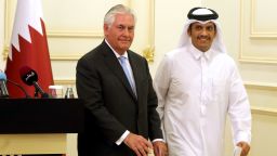US Secretary of State Rex Tillerson and Qatari Foreign Minister Sheikh Mohammed bin Abdulrahman Al-Thani leave the stage following a press conference in Doha, on July 11, 2017. (STRINGER/AFP/Getty Images)