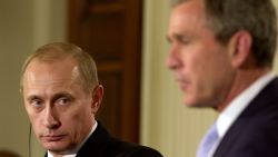 Russian President Vladimir Putin listens to U.S. President George W. Bush during their joint press conference November 13, 2001 in the East Room of the White House in Washington, DC. The two leaders discussed the 1972 Anti-Ballistic Missle Treaty and the situation in Afghanistan. 