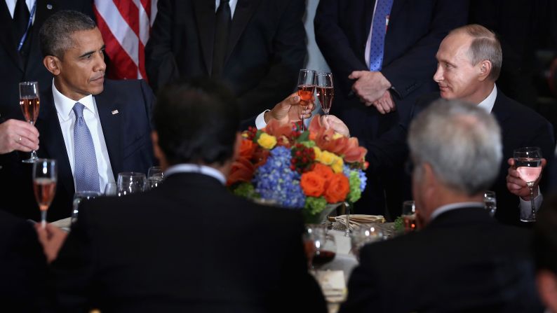 US President Barack Obama shares a toast with Putin at a luncheon in New York hosted by UN Secretary-General Ban Ki-moon in September 2015. "Amid the inevitable trials and setbacks, may we never relax in our pursuit of progress and may we never abandon the pursuit of peace," Obama said before clinking glasses. "Cheers." The two, bitterly at odds over issues in Ukraine and Syria, <a href="index.php?page=&url=http%3A%2F%2Fwww.cnn.com%2F2015%2F09%2F28%2Fpolitics%2Fobama-putin-meeting-syria-ukraine%2F" target="_blank">had a closed-door meeting</a> later in the day.