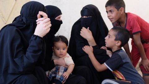 Wives of ISIS fighters and their children.