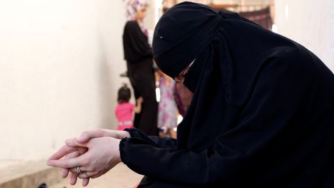 An ISIS bride wrings her hands.