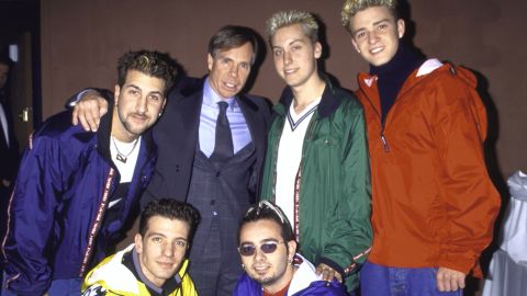 (L-R, top row) Singers Joey Fatone, Lance Bass and Justin Timberlake w. (L & R, bottom row) J. C. Chasez and Chris Kirkpatrick of musical group 'N Sync w. fashion designer Toomy Hilfiger (2L, top row) at Roseland.  (Photo by Dave Allocca/DMI/The LIFE Picture Collection/Getty Images)