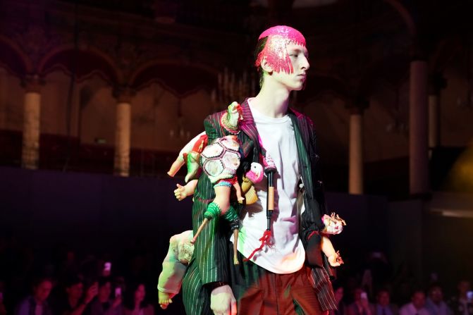 Models danced on stage while disco music played during the presentation for Rei Kawakubo's Comme des Garçons Spring-Summer 2018 collection.