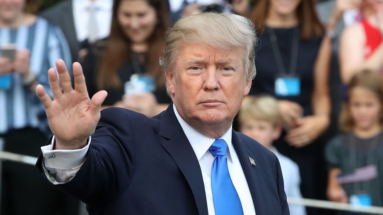 U.S. President Donald Trump waves as he walks with his wife Melania to Marine One while departing from the White House on July 12, 2017 in Washington, DC. President Trump is traveling to France where he will meet with President Emmanuel Macron and will attend Bastille Day events on Friday. 