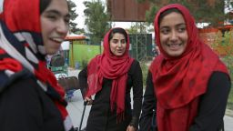 Members of a female robotics team arrive from Herat province at the Hamid Karzai International Airport, in Kabul, Afghanistan, Thursday, July 13, 2017.  The girls' applications for US visas had been denied twice, but the White House said President Donald Trump intervened and they will be allowed to participate in next week's international robotics competition along with entrants from 157 countries. (AP Photo/Rahmat Gul)