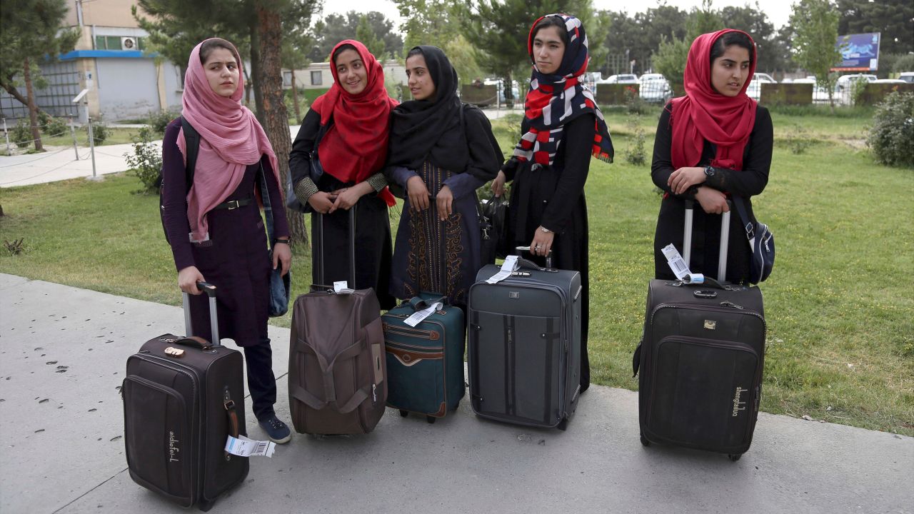 Members of a female robotics team arrive from Herat province to receive visas from the U.S. embassy, at the Hamid Karzai International Airport, in Kabul, Afghanistan, Thursday, July 13, 2017.