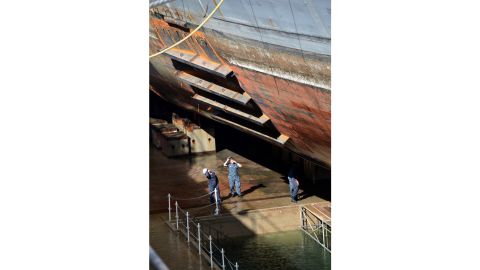 YOKOSUKA, Japan -- The Arleigh Burke-class guided-missile destroyer USS Fitzgerald (DDG 62) sits in Dry Dock 4 at Fleet Activities (FLEACT) Yokosuka to continue repairs and assess damage sustained from its June 17 collision with a merchant vessel.