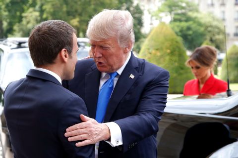 Macron greets Trump at Les Invalides.