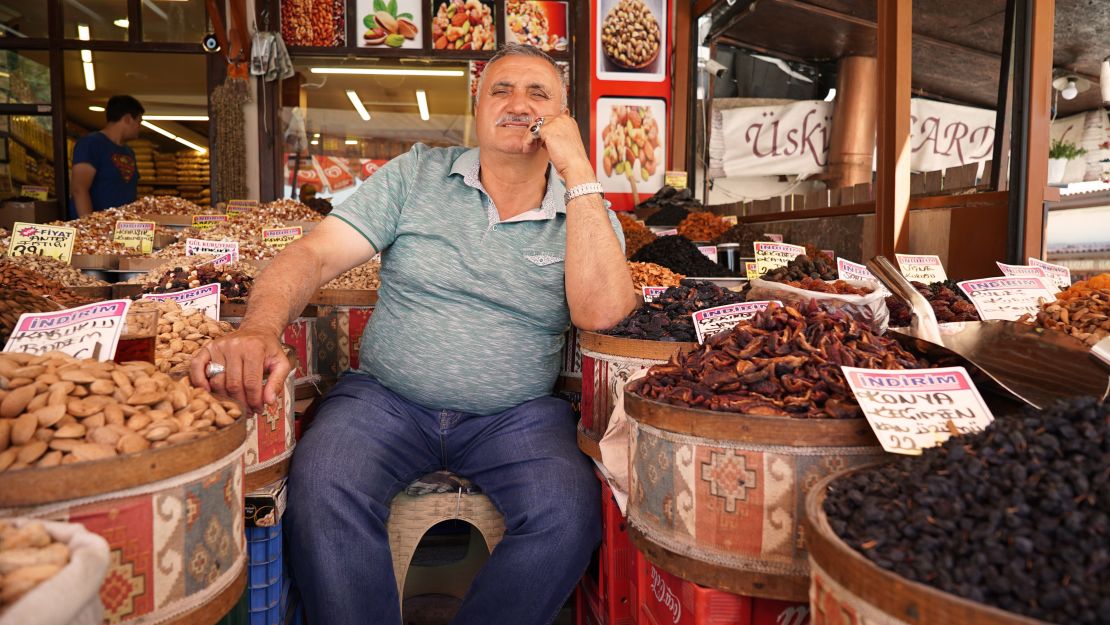 Hasan Dervisoglyu sits outside his spice and nuts stop near the Ankara castle.
